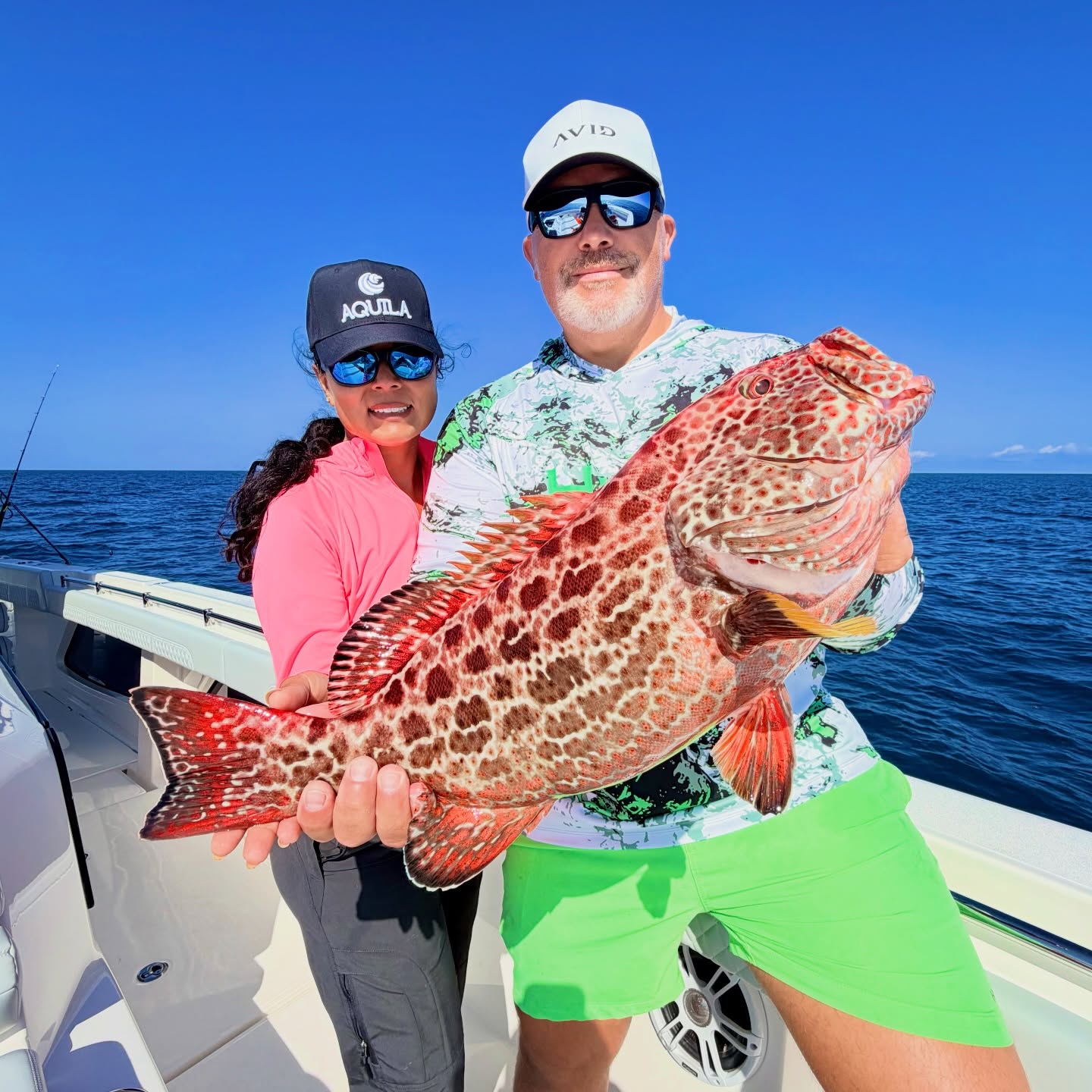 Anglers with a grouper